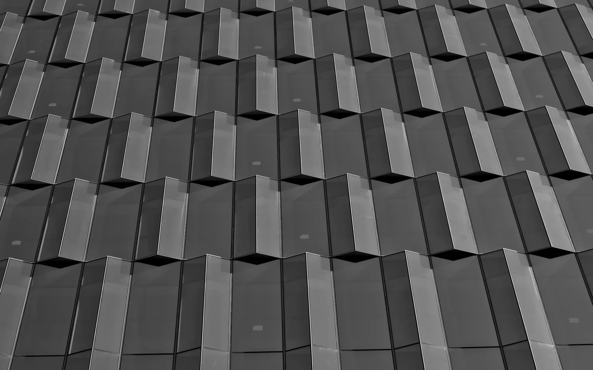 Charcoal roof shingles in a staggered pattern